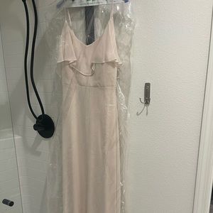 Worn once, professionally dried cleaned. No tears or stains. Like new.